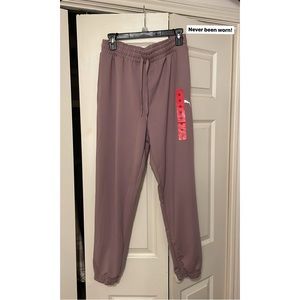 Never worn, pink puma light weight sweatpants
